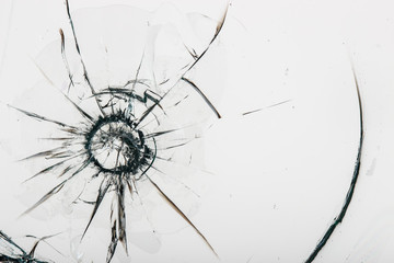 Cracked glass on a white background texture