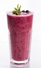 glass of smoothie on a white background