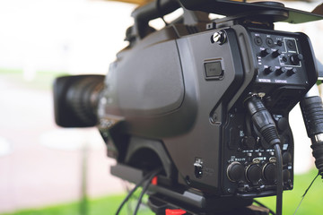broadcast tv; movie shooting or video production and film, tv camera at outdoor location