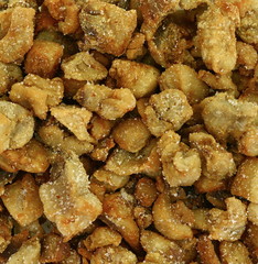 Heap of domestic salty fried pork greaves, cvarci, background.