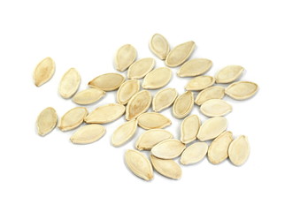 Heap of pumpkin seeds isolated on white background