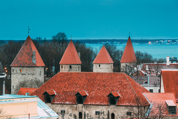 Fototapeta na wymiar Tallinn, Estonia. Part Of Tallinn City Wall. Nun's Tower Nunnatorn, Sauna Tower Saunatorn, Golden Leg Tower Kuldjala Torn. Walls of Tallinn