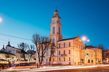 Fototapeta na wymiar Vitebsk, Belarus. Traffic At Lenina Street And City Hall In Evening Or Night Illumination At Winter