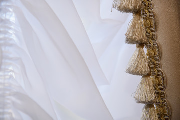 Detail Curtains classic. Interior curtains on the window.