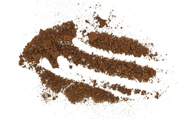 Coffee powder isolated of white background. A little coffee over a white surface. Milled coffee.