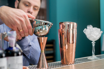 bartender prepares a great cocktail
