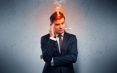 Fever businessman with burning head concept
