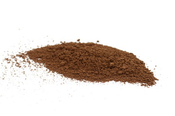 Coffee powder isolated of white background. A little coffee over a white surface. Milled coffee.