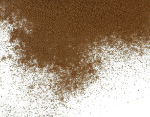 Coffee powder isolated of white background. A little coffee over a white surface. Milled coffee.