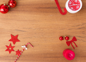 Christmas composition. Christmas gift, pine cones, fir branches on wooden golden background. Flat lay, top view