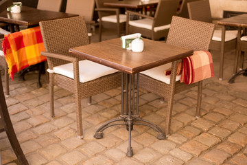 an outdoor Playground, a summer café. restaurant tables on the street