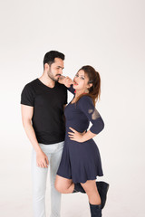Naklejka premium young couple together posing on white background