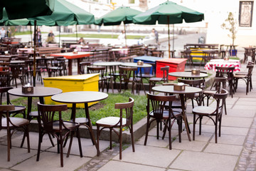 an outdoor Playground, a summer café. restaurant tables on the street