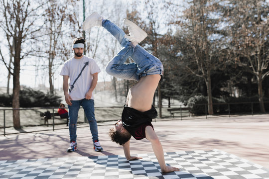 Man Dancing Breakdance In Skatepark