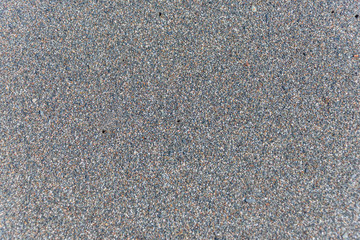 Closeup of Black Sand on a Volcanic Beach in Sicily for Backgrounds