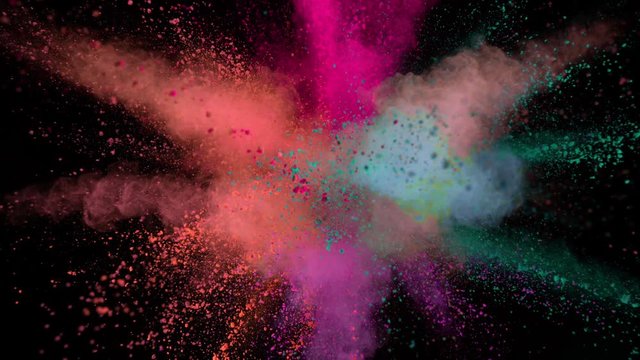 Super slowmotion shot of color powder explosion isolated on black background.
