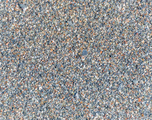 Closeup of Black Sand on a Volcanic Beach in Sicily for Backgrounds