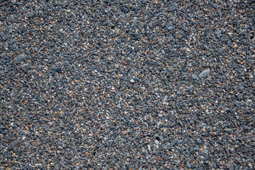 Closeup of Black Sand on a Volcanic Beach in Sicily for Backgrounds