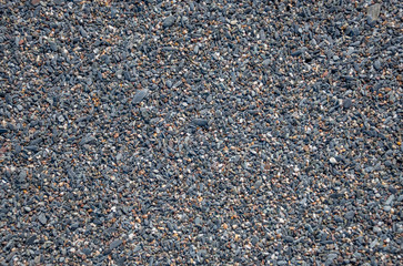 Closeup of Black Sand on a Volcanic Beach in Sicily for Backgrounds