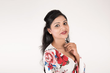 Pretty young female posing on white background