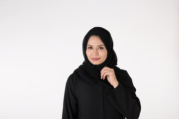 Arab woman in traditional dress on white background