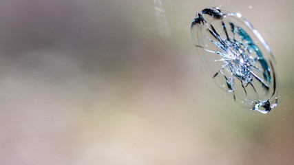 Holes and cracks on the glass On defocused background