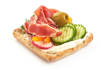 Ham, Jamon or Prosciutto open sandwich, close-up, isolated on white background