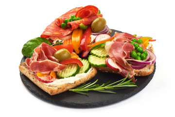 Snacks of different types of sandwiches, close-up, isolated on white background