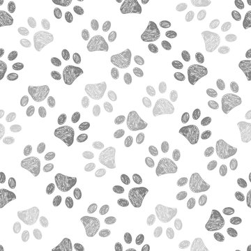 Hand drawn brown and black colored paw prints. Foot prints background