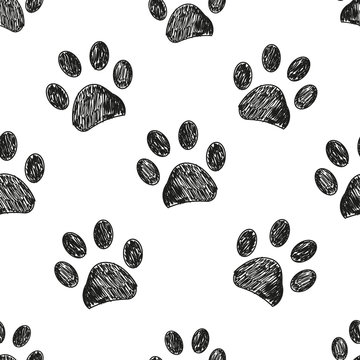 Seamless pattern for textile design. Black and white paw print pattern background