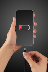 Elegant hand charging cellphone with low battery
