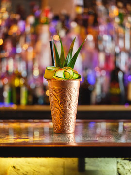 Metal cup with fruit cocktail