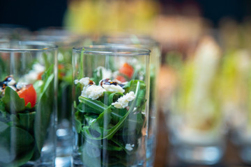 Beautifully decorated catering banquet table with different food snacks