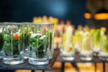Beautifully decorated catering banquet table with different food snacks