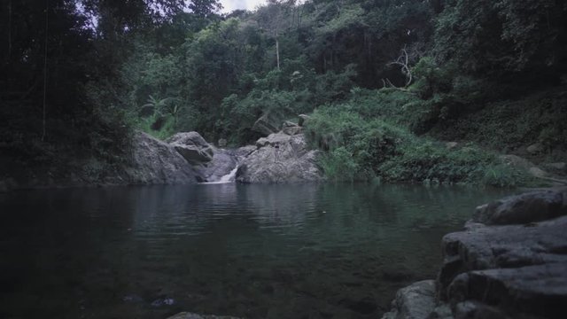 SLOW MOTION: looking over the water towards Mango Waterfall in Adjuntas, Puerto Rico