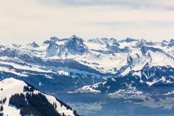 Fototapeta na wymiar Snowy peaks of beautyful mountains in Switzerland