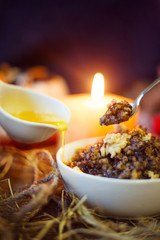 traditional ukrainian kutia dish with honey and nuts