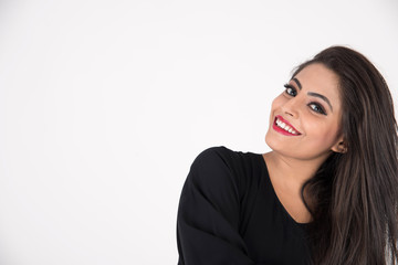 Arab woman in traditional dress on white background