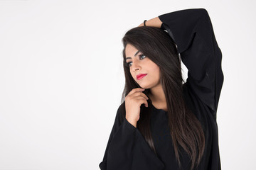 Arab woman in traditional dress on white background