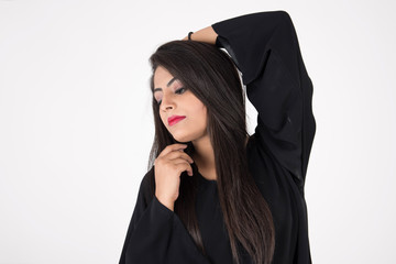 Arab woman in traditional dress on white background