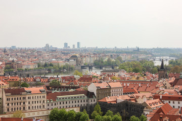 Fototapeta na wymiar Amazing scenic view from Prague castle to historical center of Prague, buildings and landmarks of old town. Horizon endless view