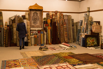The carpets on the background in the shop for special costumers from Nevsehir, Sivas and other...