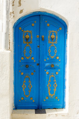 Blue Door with Traditional Decor in Sousse, Tunisia.