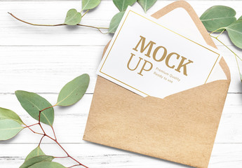 Greeting Card in Envelope on White Table Mockup
