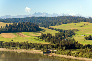 Rural landscape of Pieniny. Tatry mountains in background. Poland, Europe