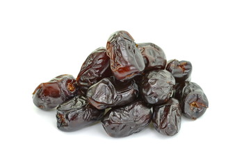 Dried dates over white background. Heap of dried dates isolated on white background.