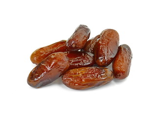 Dried dates over white background. Heap of dried dates isolated on white background.