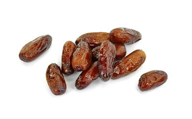 Dried dates over white background. Heap of dried dates isolated on white background.