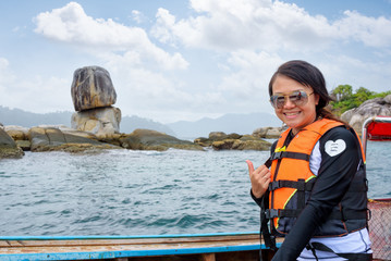 Woman on the boat at Ko Hin Sorn island in Thailand