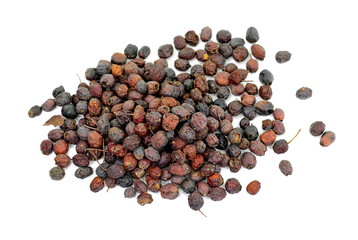 Dried medicinal herbs raw materials isolated on white. Fruit of Crataegus commonly called hawthorn, thornapple, May-tree, whitethorn, or hawberry. Cure for the heart. medicine in a cup of tea.